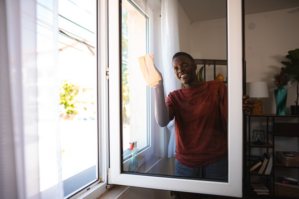 A person easily cleaning the outside of a window from indoors