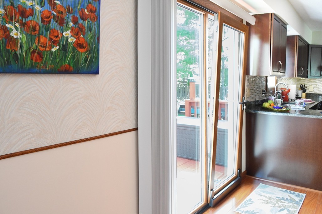 Tilt-and-slide patio door opening onto a deck