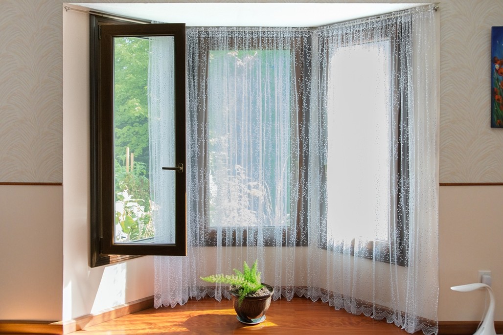 A tilt-turn window opened inward to the turn position